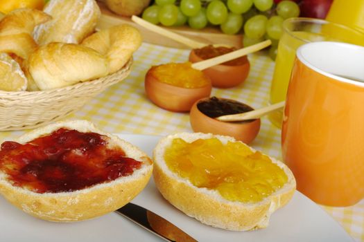 Jam breakfast with orange juice, coffee and fruits