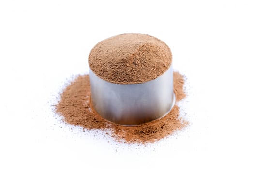 chocolate powder in a metal cup