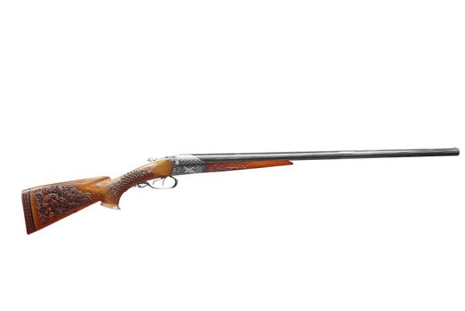 woodcut decorated hunting rifle isolated on white background