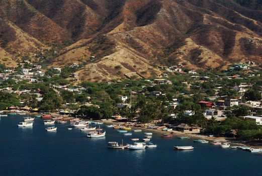 The beach of Taganga close to Santa Marta on the Caribbean coast of Colombia. Taganga is visited by many tourists and is visited for the fresh fish and the beach.