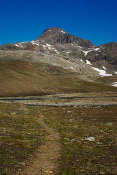 Hiking Trail in Barren Mountainscape at the Nordkalottleden, Norway