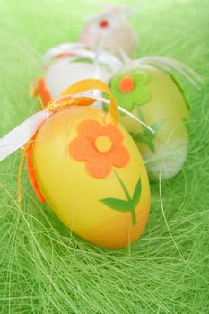 Painted Colorful Easter Eggs on green Grass