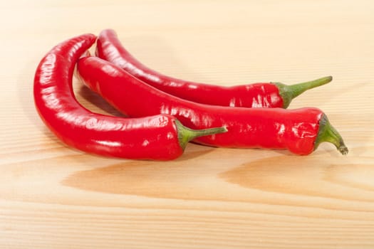 Red pepper on a wooden table