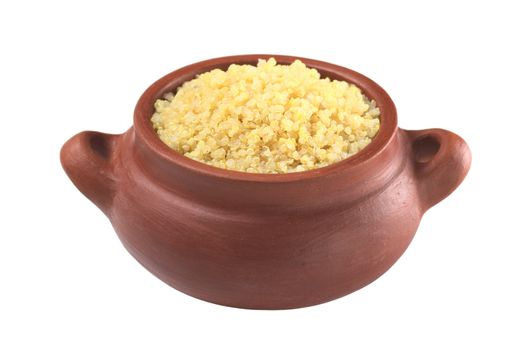 Cooked white quinoa in rustic bowl which can be eaten as a side dish like rice and is rich in proteins isolated on white (Selective Focus, Focus on the front of the quinoa) 