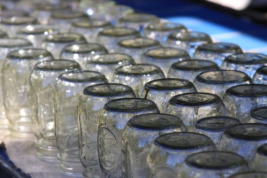 Close up of the group of glass bottles.