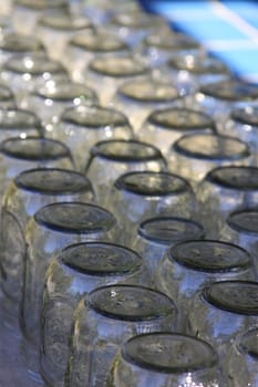 Close up of the group of glass bottles.