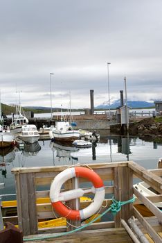 Quiet Harbor with boats in the Norwegian Sea.