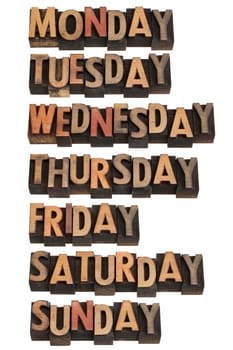 7 days of week from Monday to Sunday in vintage wood letterpress printing blocks, isolated on white