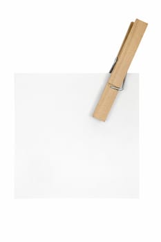 Blank note held by a wooden clothespin. Isolated on a white background.
