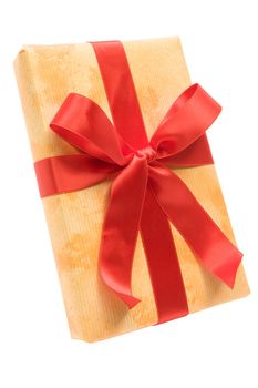 Yellow gift with red ribbon and bow. Isolated on a white background.