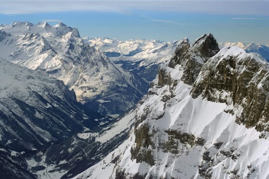 The snowy peaks of the Swiss Alps.
