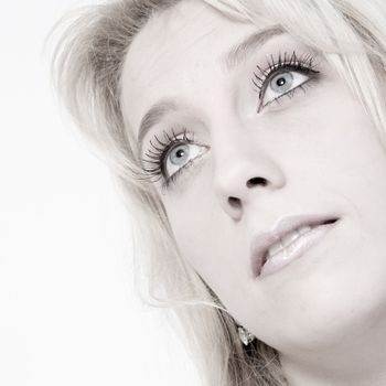 Studio portrait of a long blond girl 