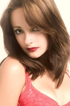 Studio portrait of pretty brunette looking  sensual