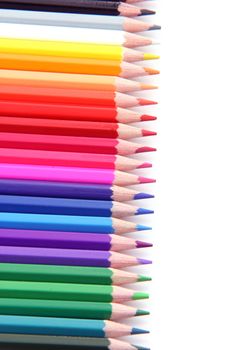 rainbow color pencils in a row isolated on white background