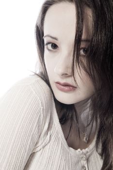 Studio portrait of pretty brunette looking sturdy