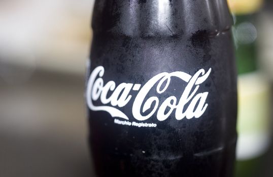 iced classic bottle of coca cola 