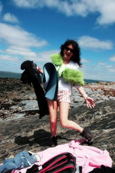 a woman ready to enjoy a day of freedom on the beach