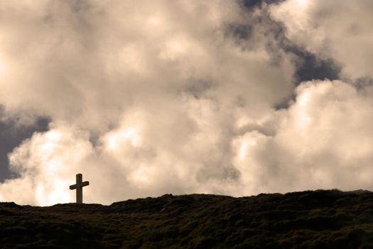 Cross on top of bear island in Ireland