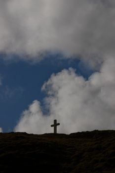 concrete Cross on top of bear island in Ireland