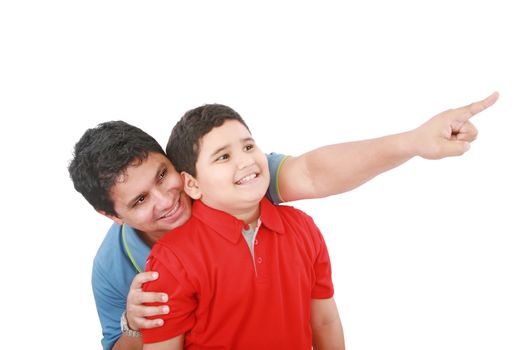 Portrait of a happy young father showing something intersting to his son against white background