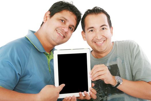 Two young men or businessmen showing a tablet PC computer and smiling