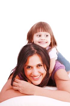 mom and her little girl playing on pillow