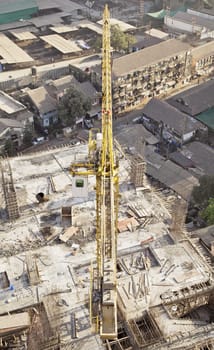 plan view of street, building site with crane