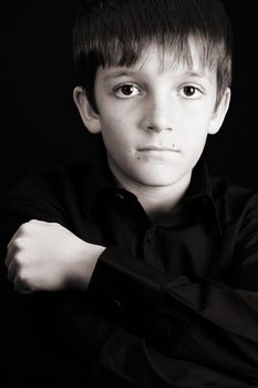 Young boy with big eyes in casual attire