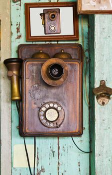 An old telephone  vintage on old wall