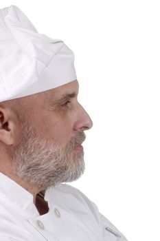 Portrait of a chef looking right on white.