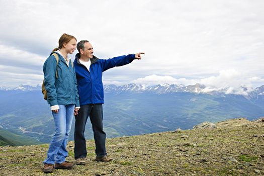 Father and daughter enjoying scenic Canadian Rocky Mountains view in Jasper National park