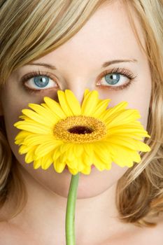 Beautiful girl and yellow flower