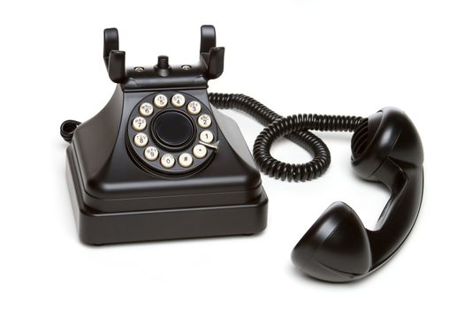 Isolated old black vintage telephone