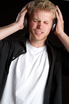 Boy listening to headphones music