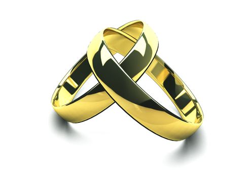 Wedding rings closeup on white background with shadow