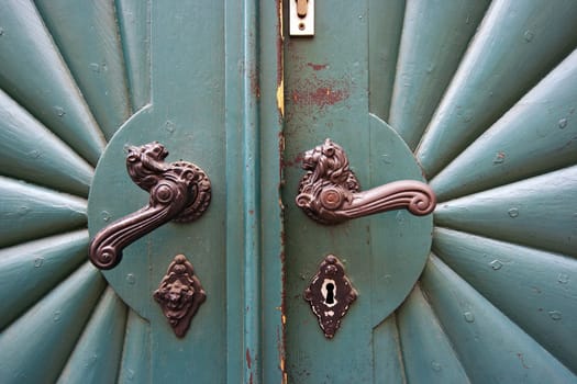 Detail of the closed and locked old door