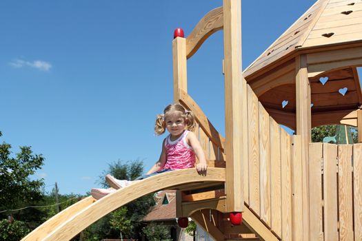 beauty little girl on playground