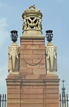 Gatepost with stone carved elephants. Entrance to Rashtrapati Bhavan (former Viceroy's House when Indian was under British rule). New Delhi, India