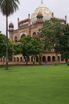 Safdarjang's Tomb in Delhi. Mogul style mausoleum made of red sandstone inlaid with white marble and topped by a white marble dome.