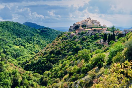 Picturesque little town on the top of hill, Italy