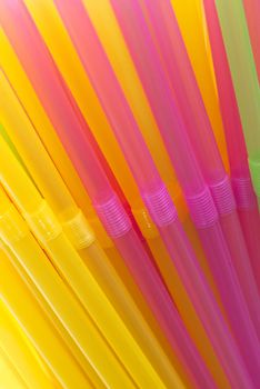Colorful drinking straws background.
