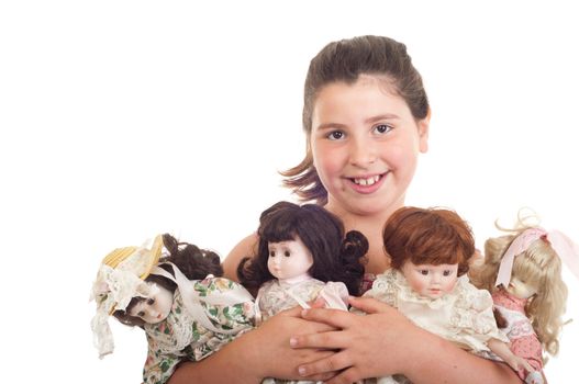 joyful little girl with her favorite dolls (isolated on white background) 