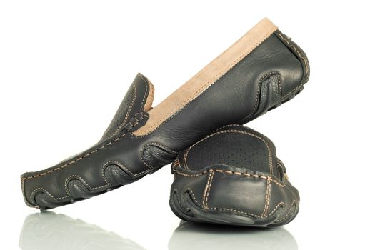 Modern black mens shoes moccasins over white