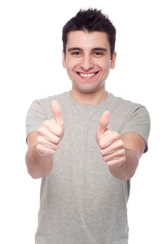 handsome young man with thumbs up on an isolated white background