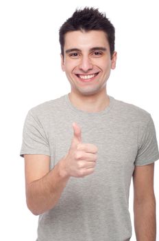 handsome young man with thumbs up on an isolated white background