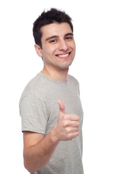 handsome young man with thumbs up on an isolated white background