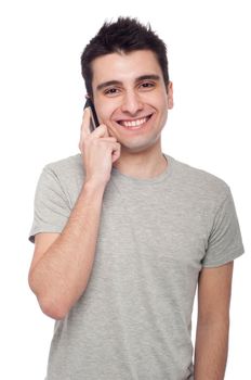 young casual man talking on the phone isolated on white background 