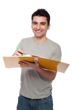 smiling young man studying with a dossier (isolated on white background)