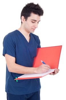 handsome male doctor making a note isolated on white background