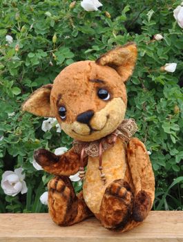 Handmade, the sewed plush toy: Ron fox cub on a board among flowers